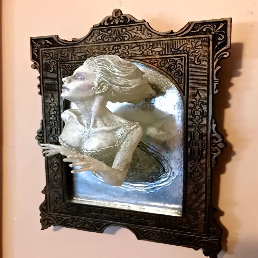 Spooky Wall Sculptures Ofvictorian Ghosts Emergingfrom A Mirror