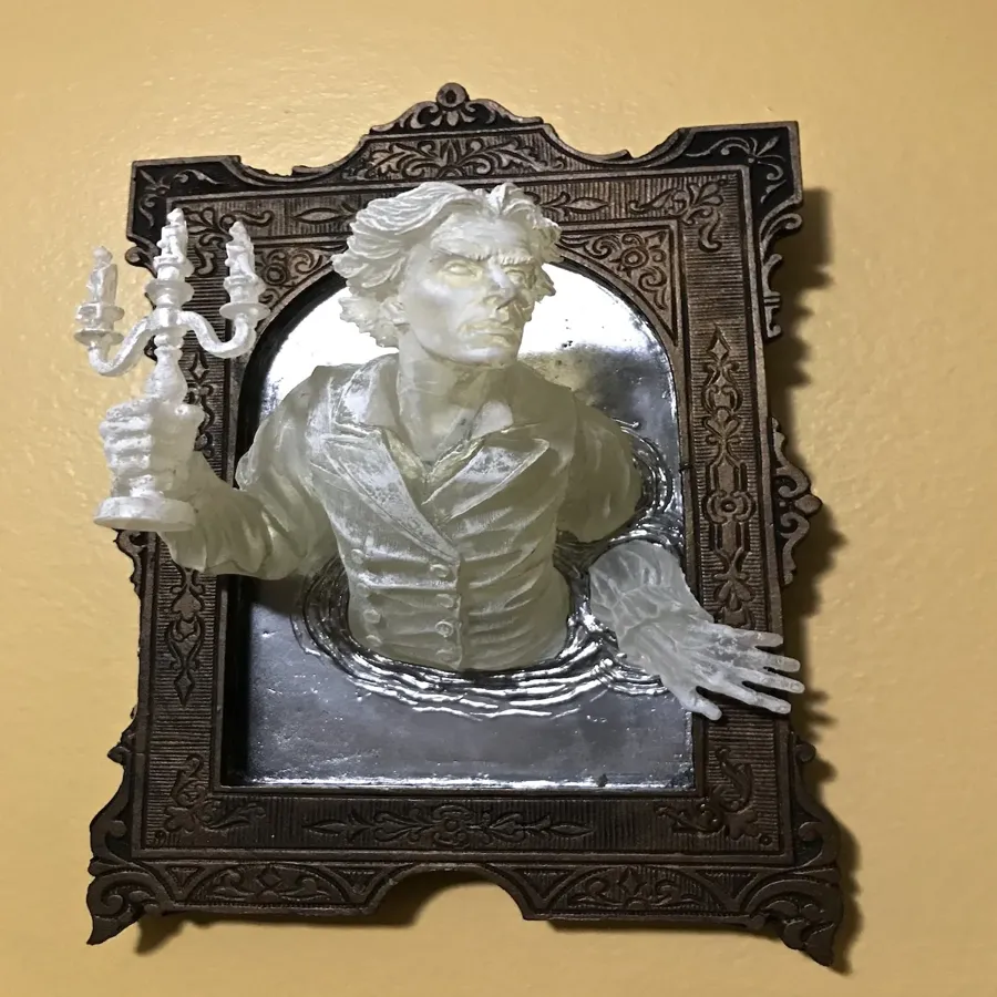 Spooky Wall Sculptures Ofvictorian Ghosts Emergingfrom A Mirror